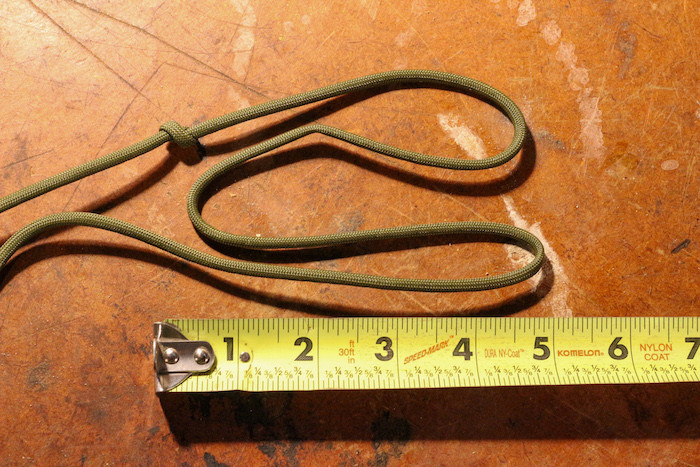 Make another loop of the same length, directly below,you should end up with an.