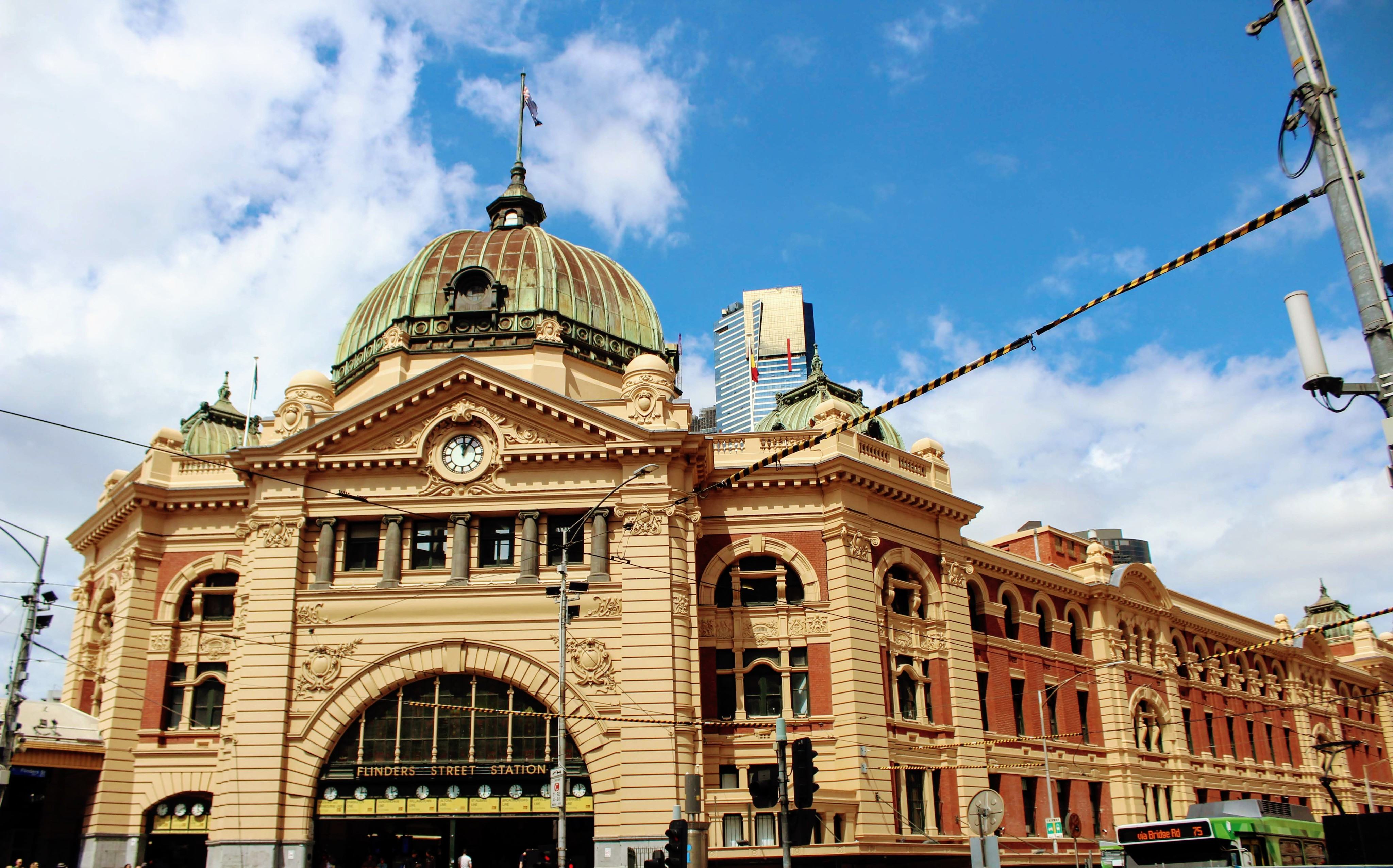 Flinders Station in Melbourne, Australia, showcases the city's vibrant architecture and bustling atmosphere