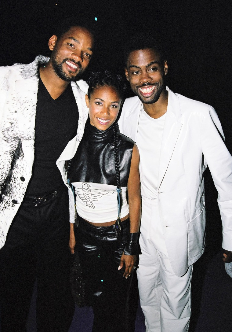 Will Smith, Jada Pinkett Smith and Chris Rock during 1999 MTV Music Awards Party, showcasing their early interactions and camaraderie within the entertainment industry