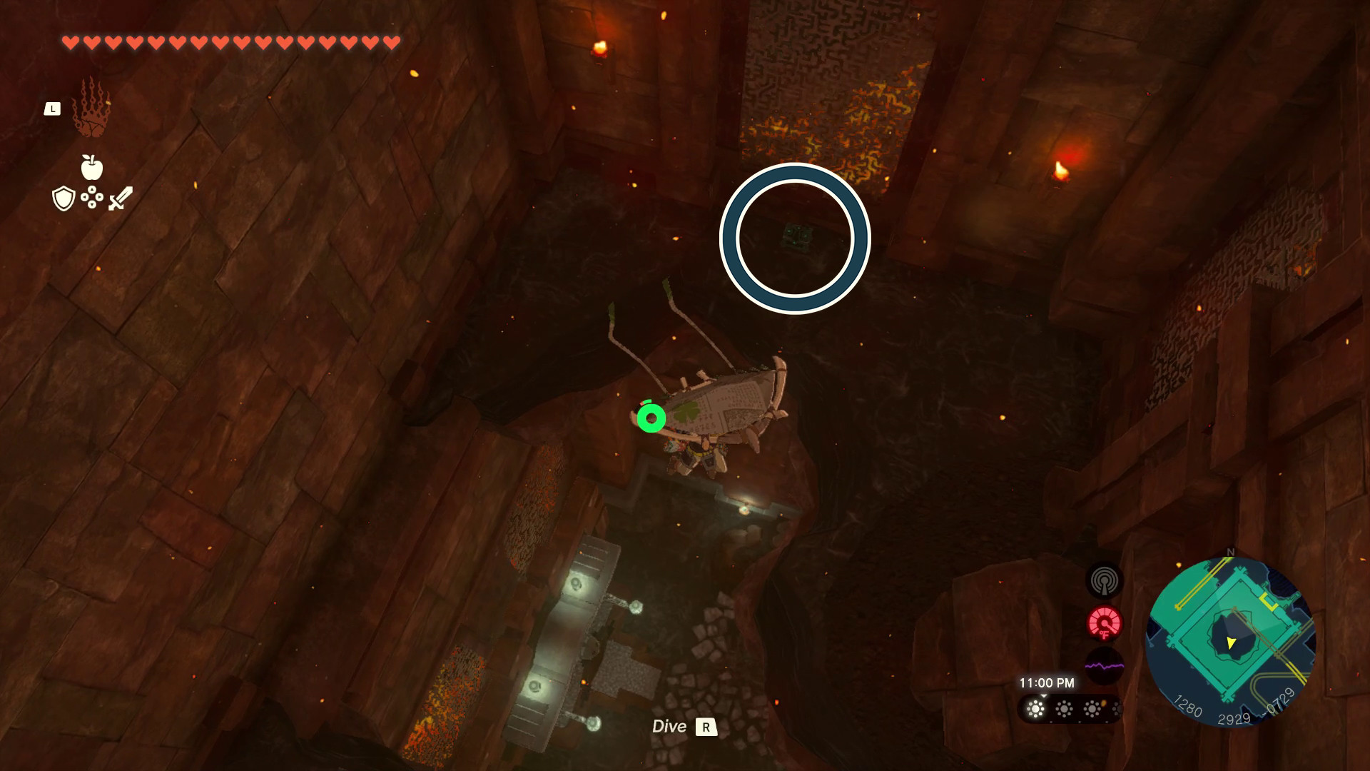 A blue circle points out a faint Zonai chest on the ledge of a room in the Tears of the Kingdom Fire Temple