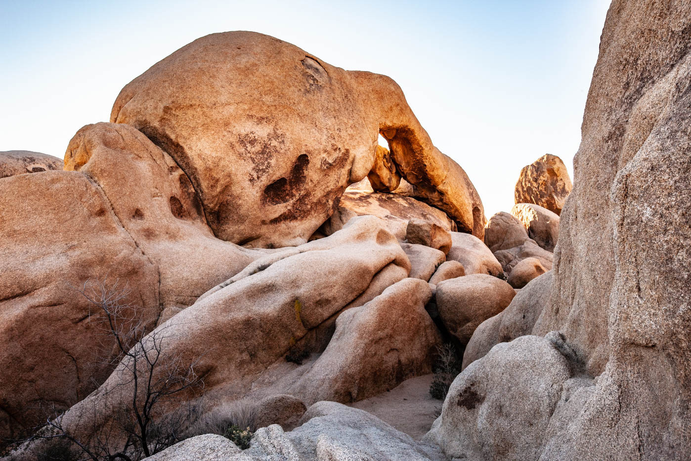 Arch Rock surrounded by desert landscape