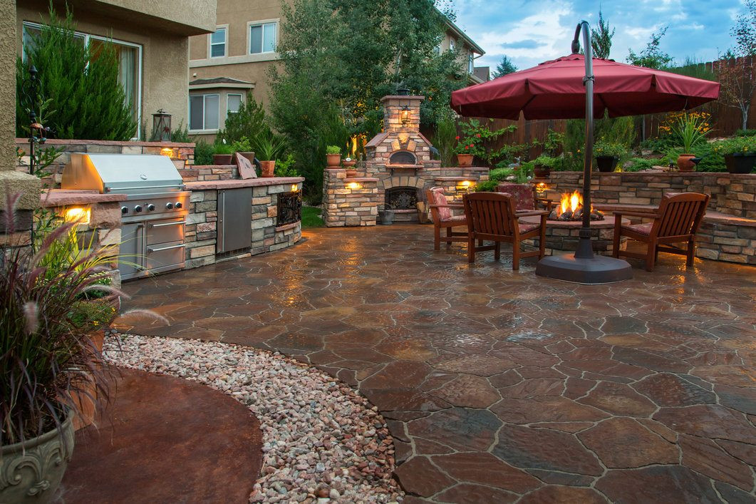 House and Garden With a Crushed Stone Terrace Patio and Stepping Stones 
