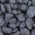 Pile of fire pit lava rock enhancing heat distribution