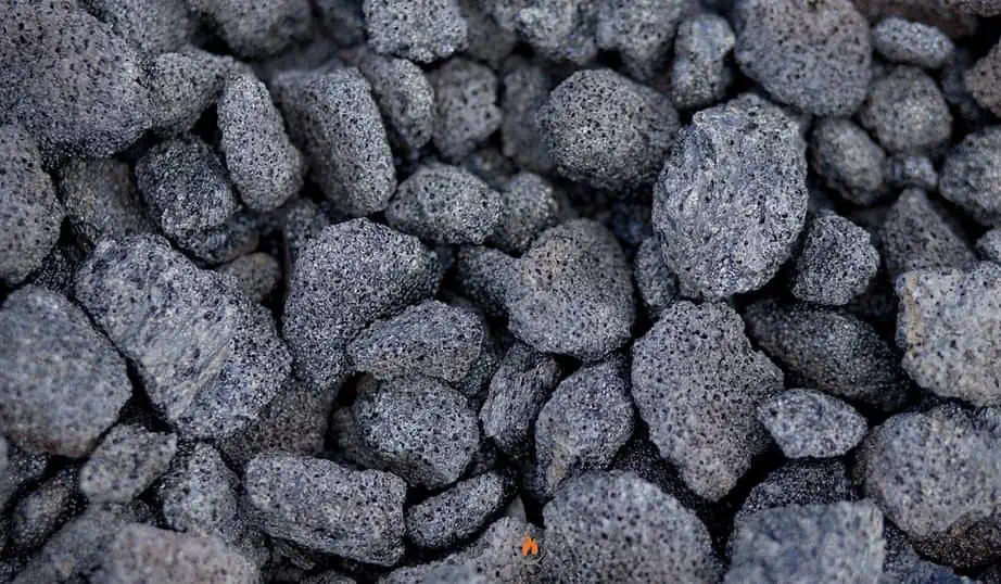 Pile of fire pit lava rock enhancing heat distribution