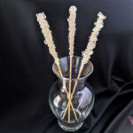 Rock candy sticks in a vase, ready for the crystal-growing process.