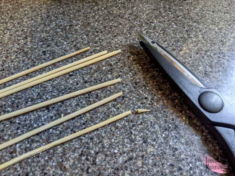 Skewers trimmed next to a pair of scissors