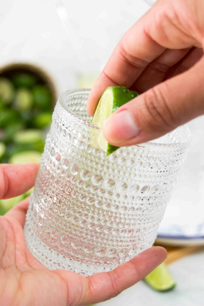 Salting the rim of a margarita glass