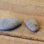 Carving river rocks with a Dremel using a rotary tool to shape the stone