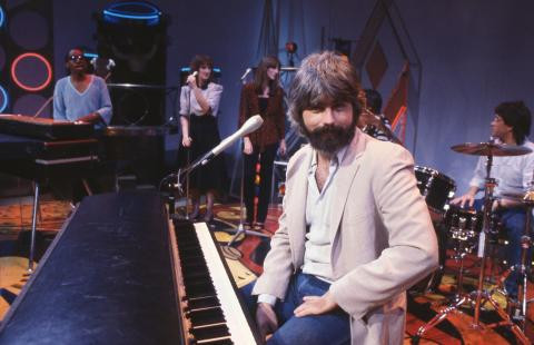 Michael McDonald on stage with band