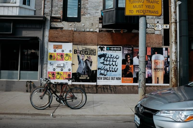 Music posters and flyers, representing the traditional methods of promoting rock bands and live performances