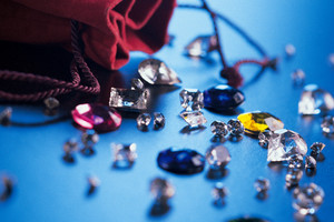 Magnifying glass examining rock