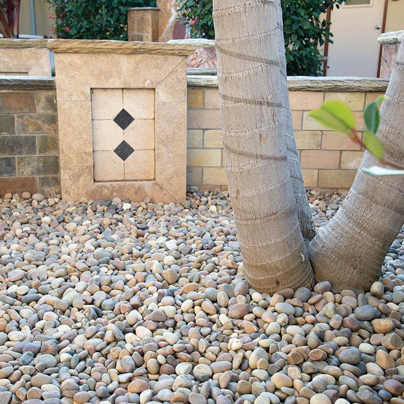 Rainbow beach pebbles used as ground covering