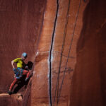 Climber taking a short break to recover strength before continuing their ascent