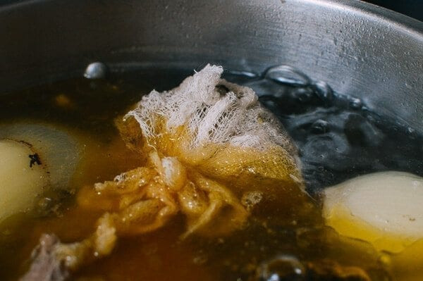 charring onion over the stove