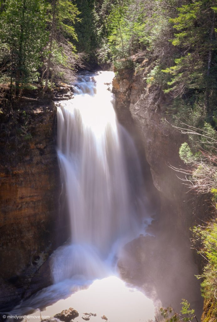 Miners Falls with water cascading down rocks amidst lush greenery