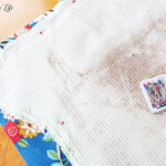 Pin the old cushion pieces to your new fabric