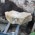 Arranging keystone rocks for a rock garden