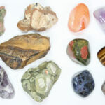 Different stages of tumbled rocks
