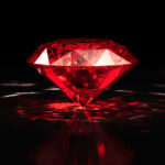 Moussaieff Red Diamond, showcasing its remarkable red hue derived from the plastic deformation of its crystal lattice.
