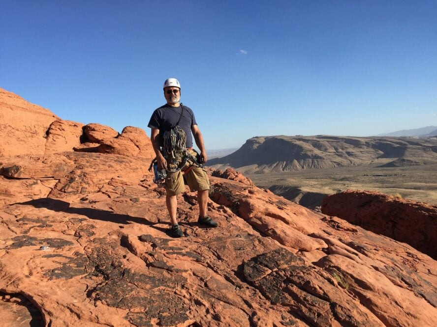 Red Rock Canyon's Aztec Sandstone cliffs beckon climbers with their unique texture and stunning red hues, providing a lifetime's worth of climbing adventures.