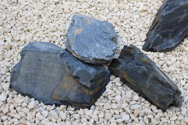 Arrangement of slate rockery stones for a pond