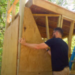 Marking the locations of support braces on plywood panels for a climbing wall