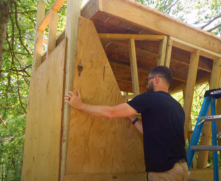 Marking the locations of support braces on plywood panels for a climbing wall
