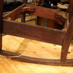 Rocking chair with broken runner before repair
