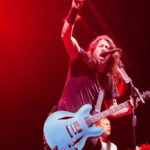 Dave Grohl singing with guitar