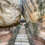Boulder gardens with natural rock formations on the way to Sigiriya Rock.