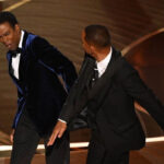 Actor Will Smith slaps comedian Chris Rock onstage during the 94th Academy Awards at the Dolby Theatre in Hollywood, March 27, 2022.
