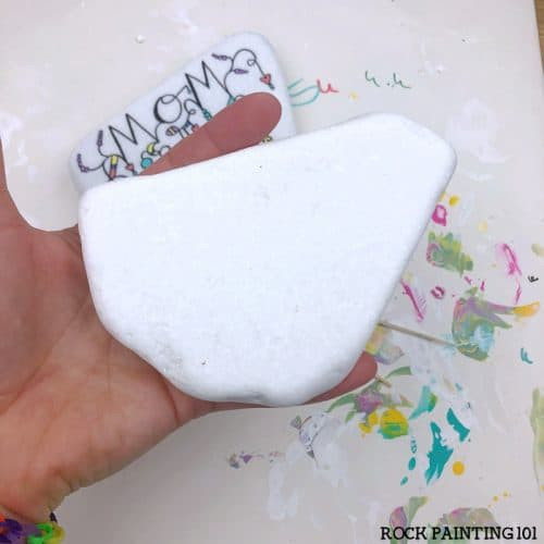 Selection of smooth white rocks ideal for decorative painting projects.