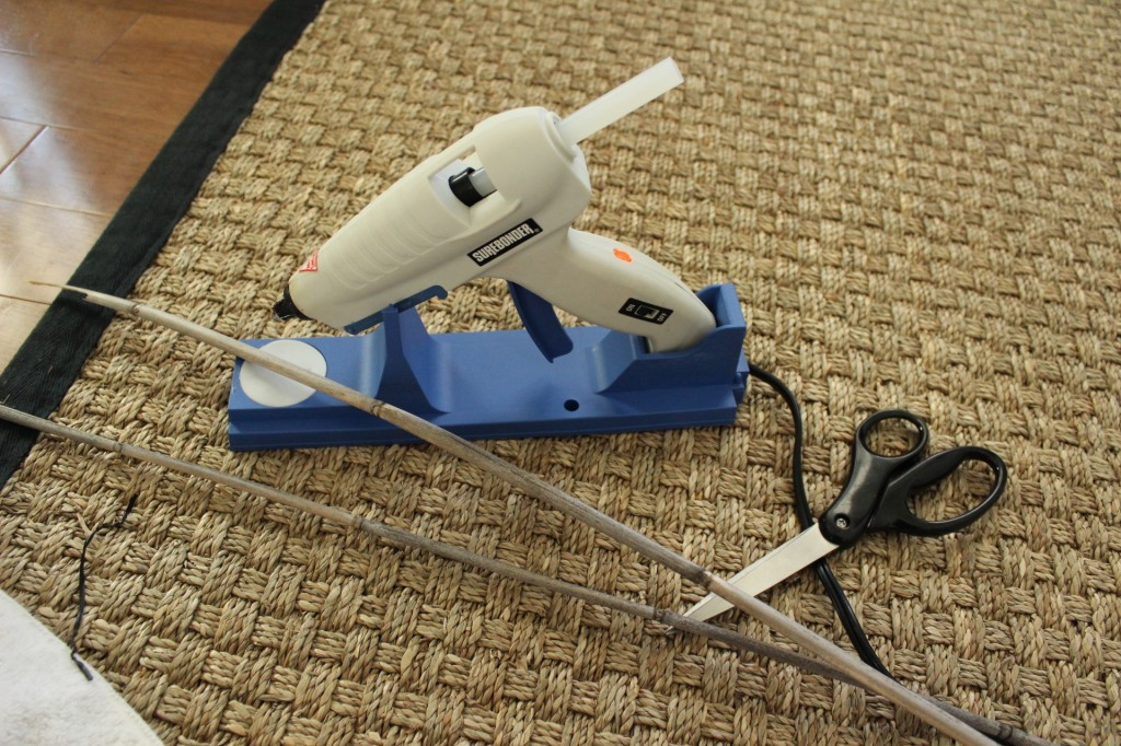 Applying glue to wicker strands for secure attachment during repair
