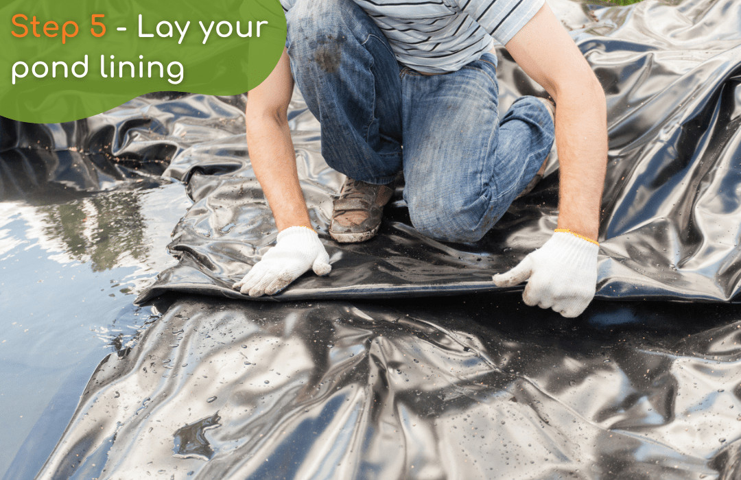 Laying a pond lining sheet inside a garden pond