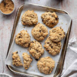 A close-up view showcasing the ingredients for rock cakes, including flour, butter, sugar, and dried fruits.