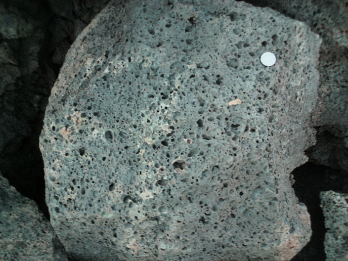 Vesicular basalt rock with bubbles formed during cooling