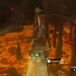 Link rides a minecart forward, pointing Yunobo, who is rolling in a ball, at a circular device in front in Tears of the Kingdom