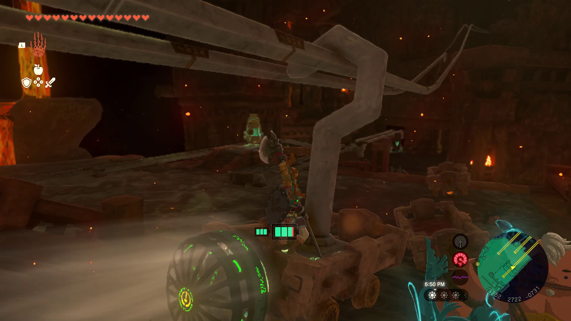 In Tears of the Kingdom, Link rides a minecart attached to a hook and rail to cross a broken track