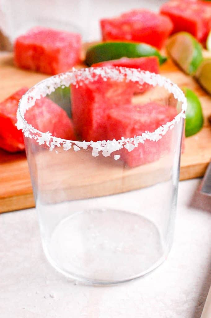 Empty margarita glass with salt rim