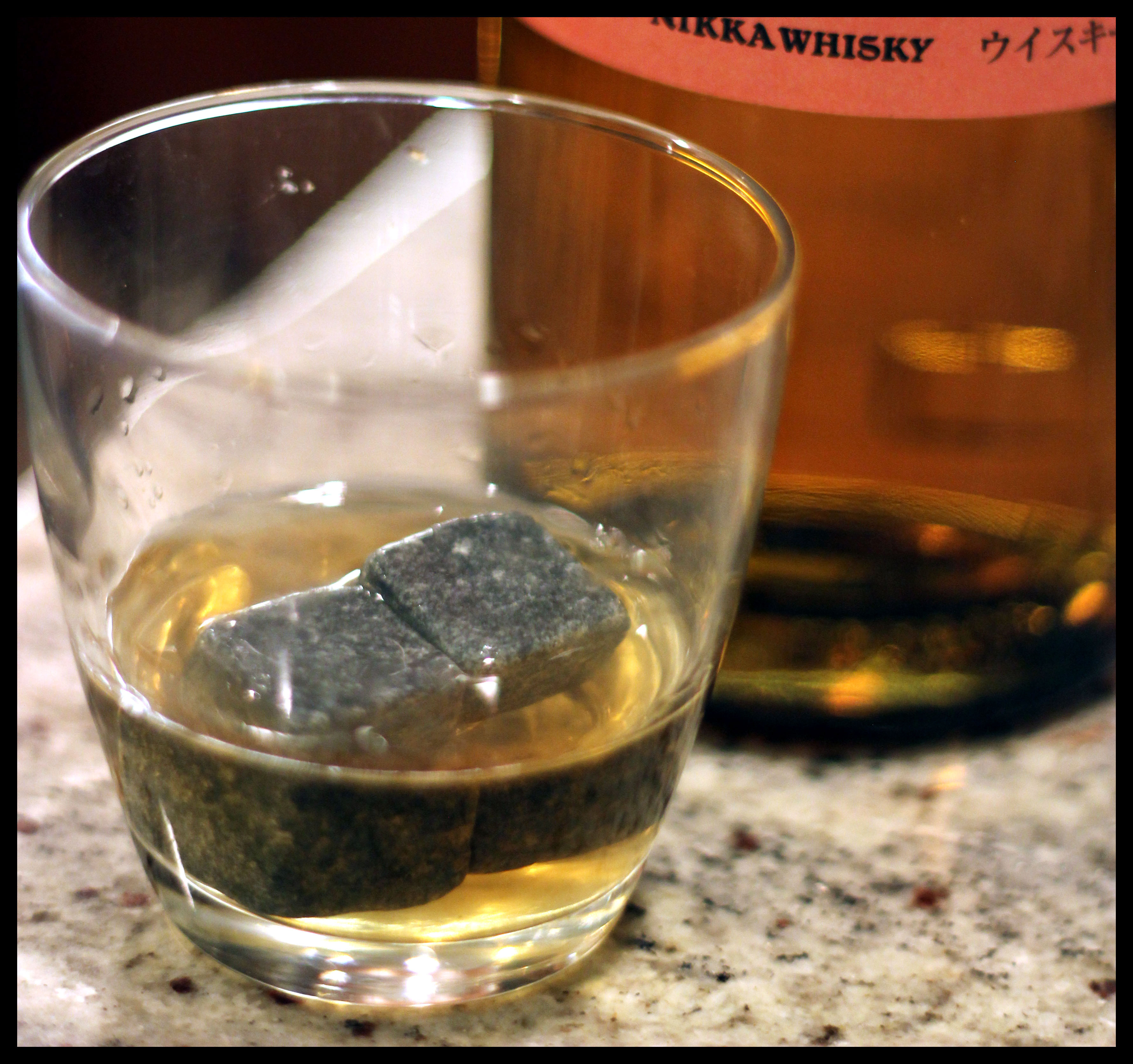 Whiskey stones in a glass of whiskey
