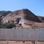Sign requesting visitors not to climb Uluru